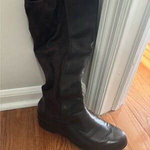 Boots to the knee. Back is suede rest is soft dark chocolate brown leather